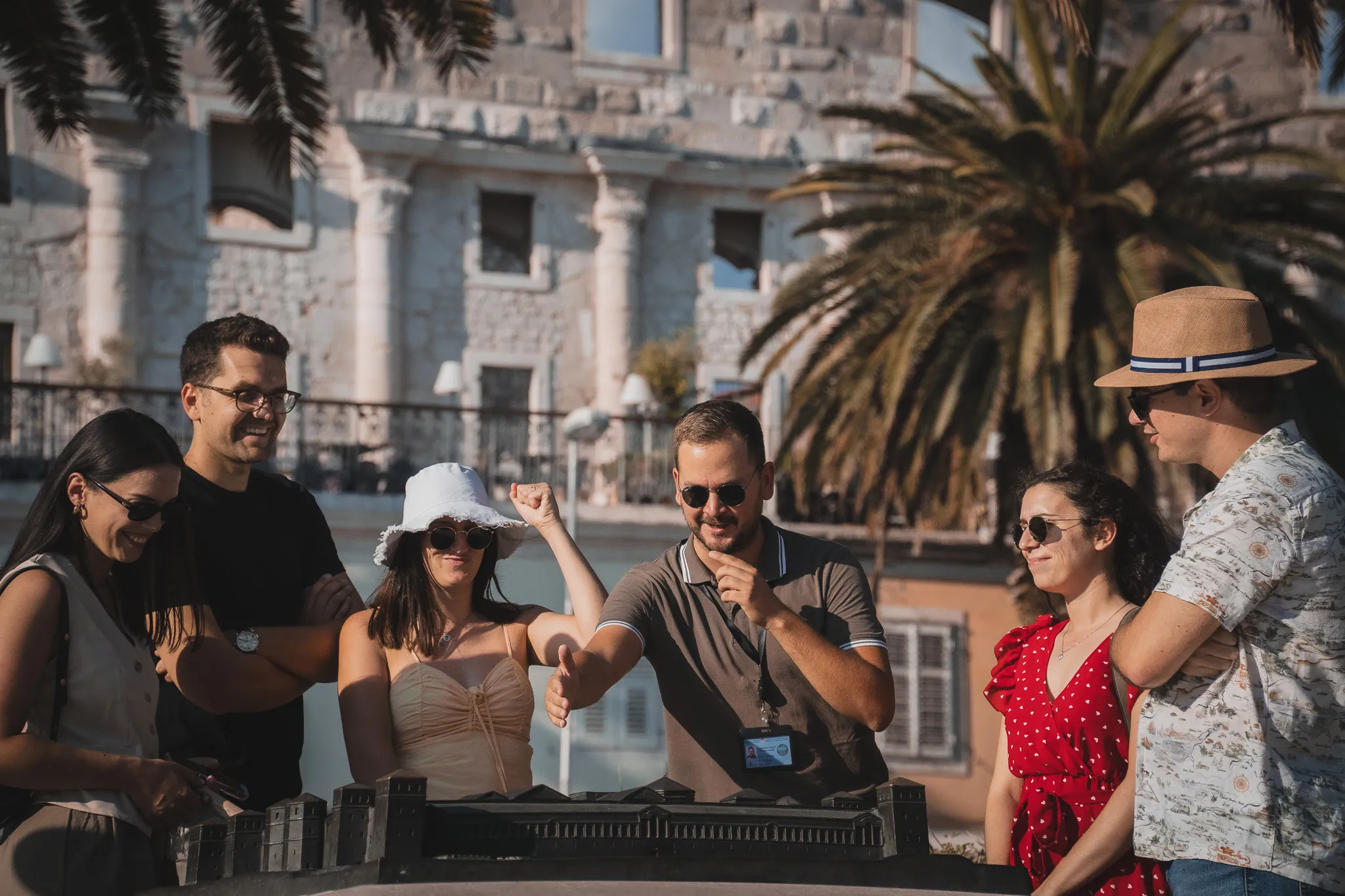 tour guide explaining history to group